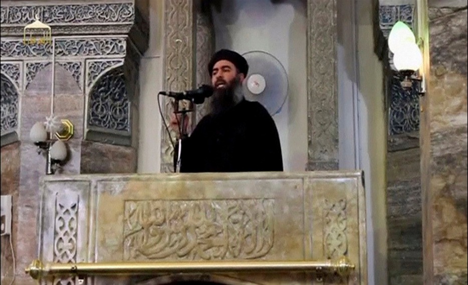 [資料写真]演説するISの指導者バグダディ。2014年7月、ビデオ映像から撮影（ロイター/アフロ）