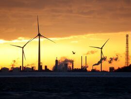 Onshore wind turbines in Wilhelmshaven, Germany. Photographer: Liesa Johannssen/Bloomberg