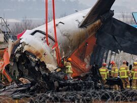 The wreckage of Jeju Air Flight 2216 at Muan International Airport on Dec. 30. Photographer: SeongJoon Cho/Bloomberg