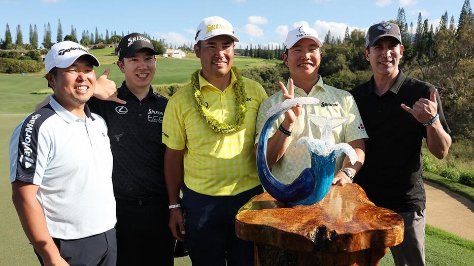 開幕戦ザ・セントリーを制した松山英樹選手（中央）（写真：Getty Images）