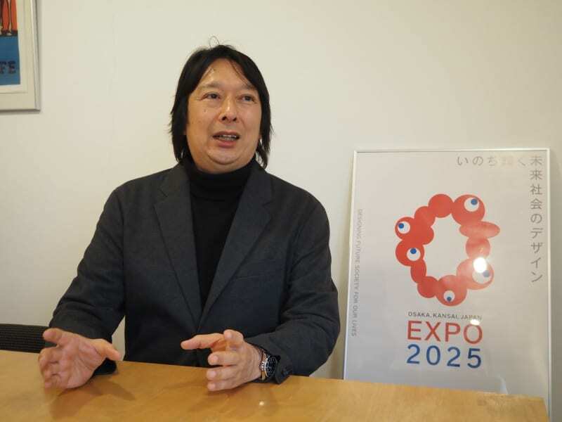 インタビューに答える、会場運営プロデューサーの石川勝氏＝１１月１５日、東京都