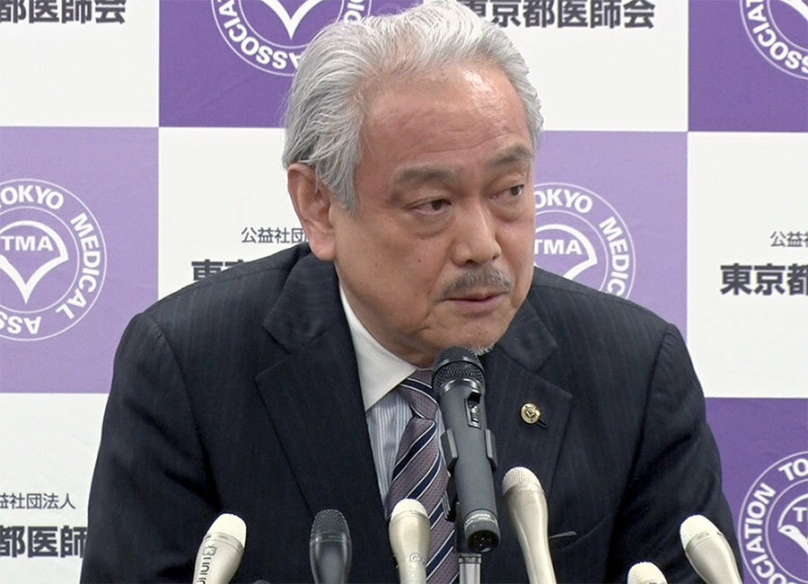 会見した尾崎治夫会長