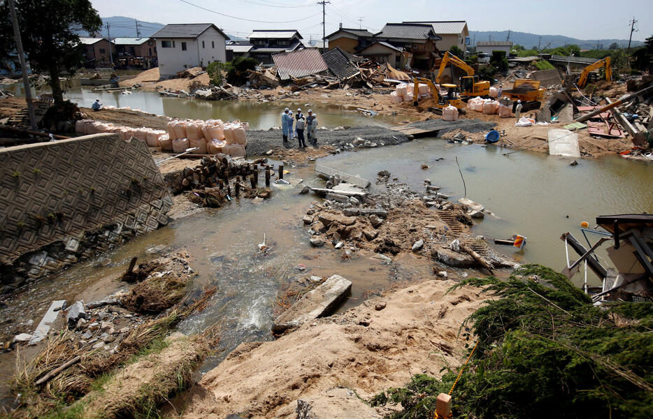 西日本豪雨も線状降水帯の停滞が大きな原因だった。写真は甚大な被害が出た岡山県倉敷市真備町（写真：ロイター/アフロ）