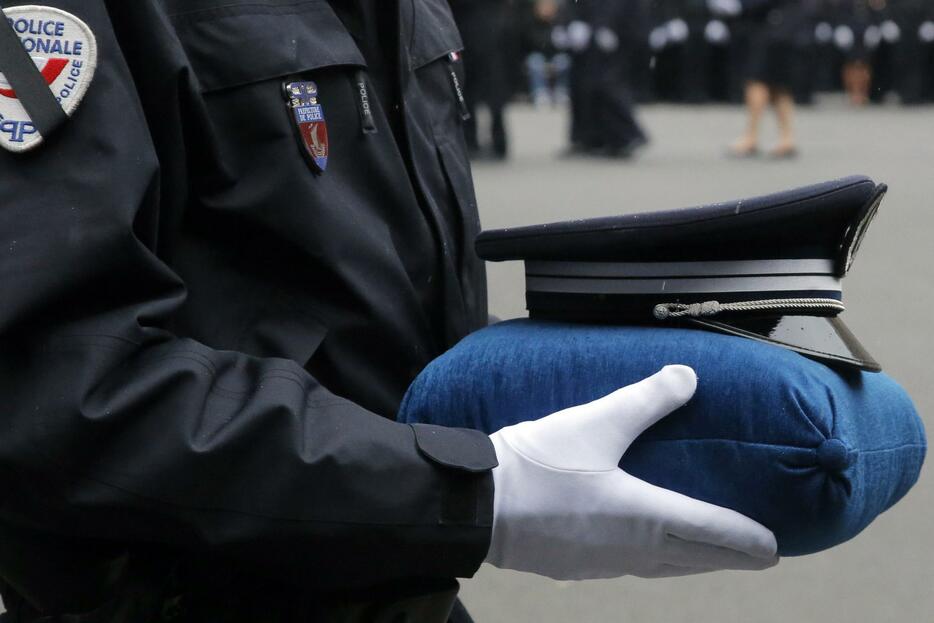 フランス紙襲撃テロ事件 犠牲になった警官を追悼＝1月13日（代表撮影/ロイター/アフロ）