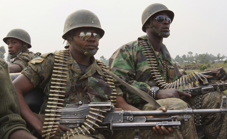 ゴマ市郊外で戦闘軍と反政府勢力が衝突。2013年7月（写真：ロイター/アフロ）