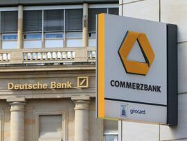 A Commerzbank AG bank branch, near a Deutsche Bank AG branch, in Frankfurt. Photographer: Krisztian Bocsi/Bloomberg