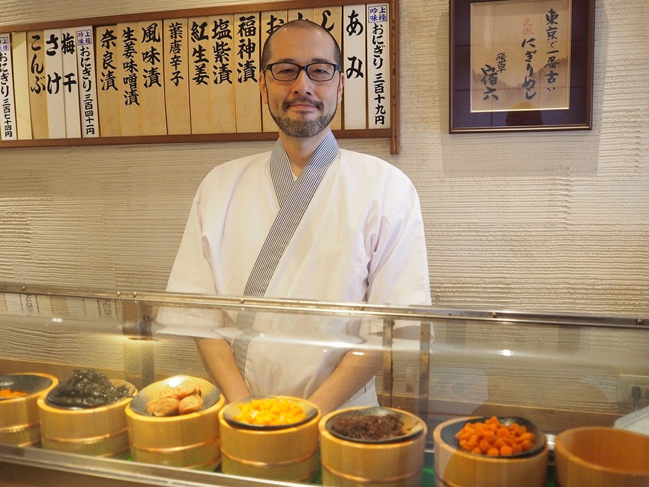 3代目店主の三浦洋介さん。30歳までプロのフルート奏者だったキャリアを持つ