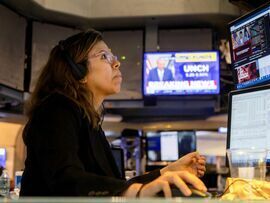 <p>A trader works on the floor of the New York Stock Exchange (NYSE) in New York, US, </p>