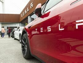 A Tesla Inc. electric vehicle at a showroom in Shanghai. Photographer: Qilai Shen/Bloomberg