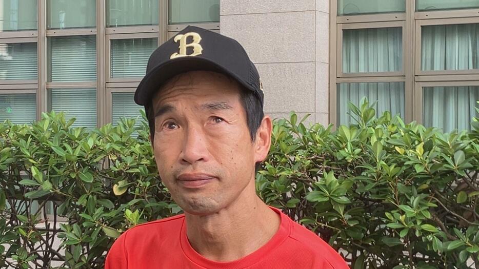 判決公判後に取材に応じた大久保孝之さん（51）