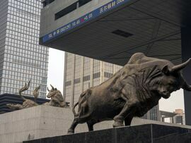 A bull statue in front of the Shenzhen Stock Exchange building in Shenzhen, China. Photographer: Raul Ariano/Bloomberg