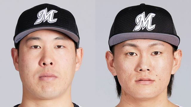 左からロッテ・西野勇士投手と山本大斗選手