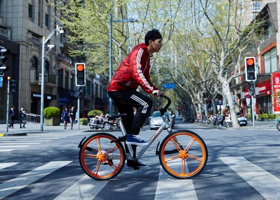 街中でこの自転車を漕ぐ人を最近よく見かけるようになった（北京摩拜科技有限公司）