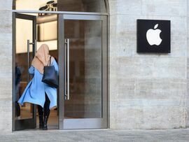 <p>A shopper enters an Apple store  in Berlin, Nov. 24, 2023. </p>
