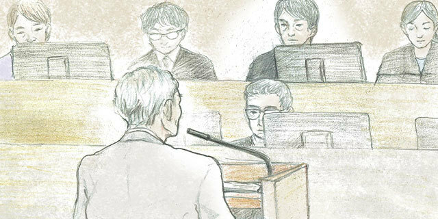 グレーのジャケットを羽織り公判に臨んだ吉田友貞被告