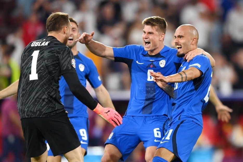 試合終了の瞬間、スロベニアが歓喜！（写真◎Getty Images）