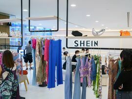 Clothes displayed at the Shein Group Ltd. headquarters in Singapore. Photographer: Ore Huiying/Bloomberg