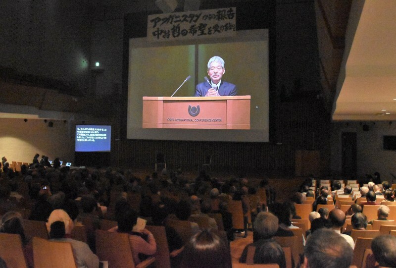 ペシャワール会の報告会で上映された故・中村哲さんの講演映像＝福岡市早良区で2024年11月16日午後2時21分、池田真由香撮影