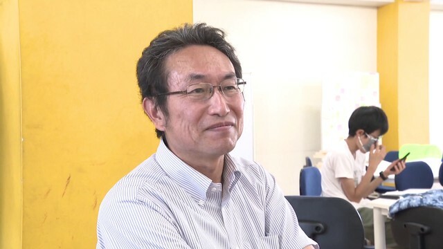 天文部顧問の成田英宏教諭