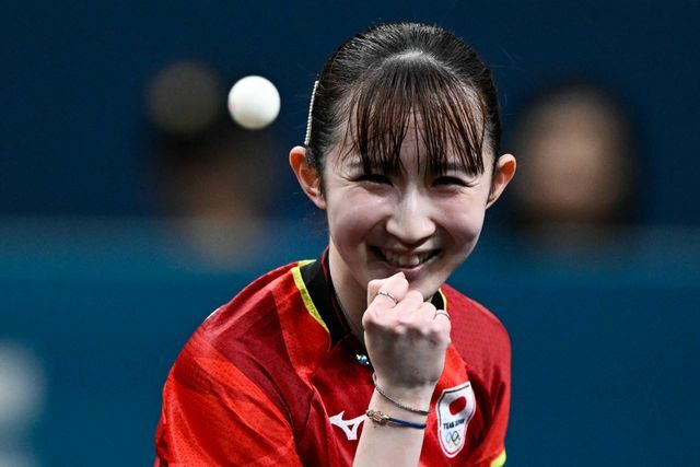 笑顔を見せる早田ひな選手（写真：AFP/アフロ）