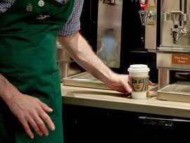 A barista makes a coffee at a Starbucks location in New York.