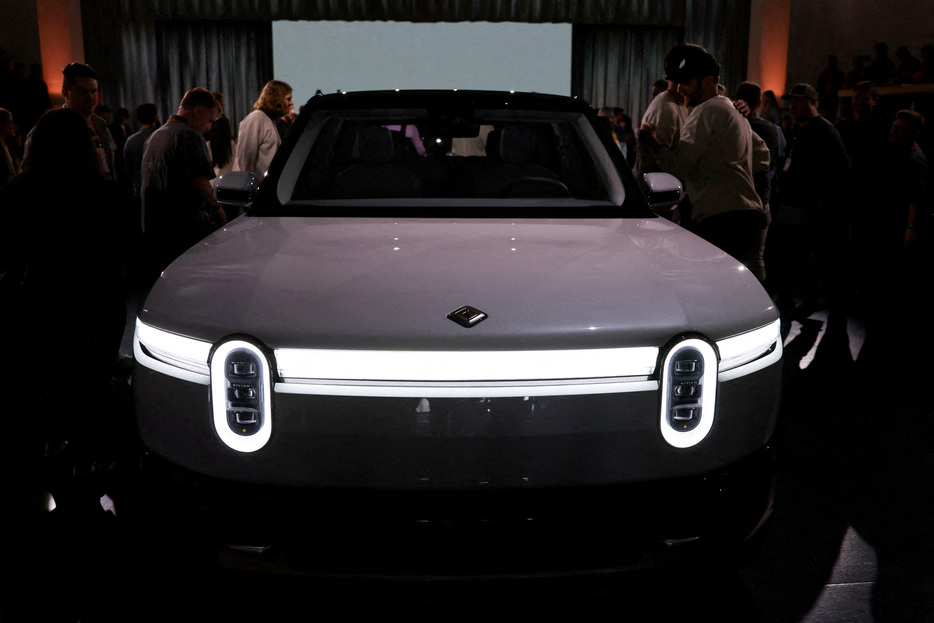 FILE PHOTO: Electric truck maker Rivian unveils R2 SUV during an event in Laguna Beach, California, U.S. March 7, 2024. REUTERS/Mike Blake/File Photo