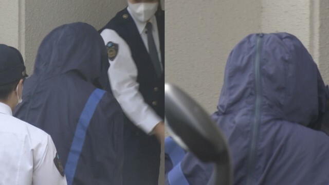 送検される容疑者　12日