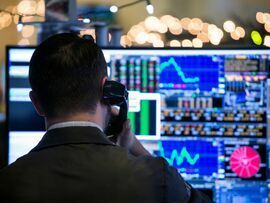 A trader works on the floor of the New York Stock Exchange.