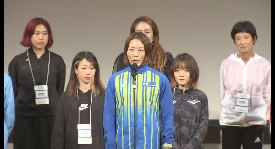 レセプションで健闘を誓う堀江美里選手