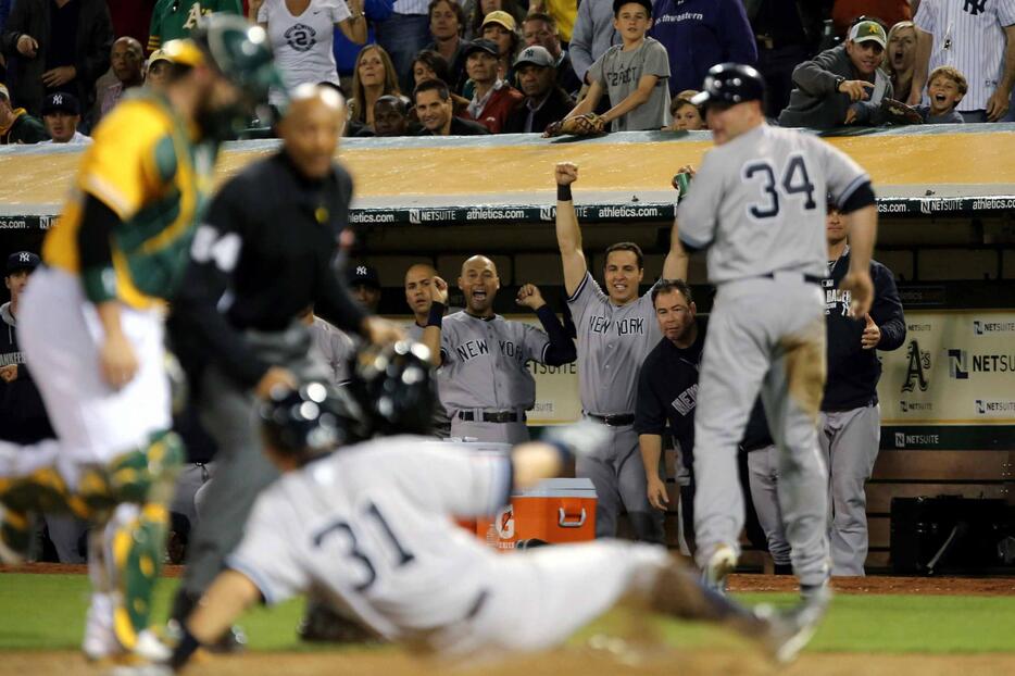 相手のエラーの間に本塁を陥れる＝2014年6月13日（写真：USA TODAY Sports/アフロ）