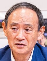 首相とは距離がある菅氏