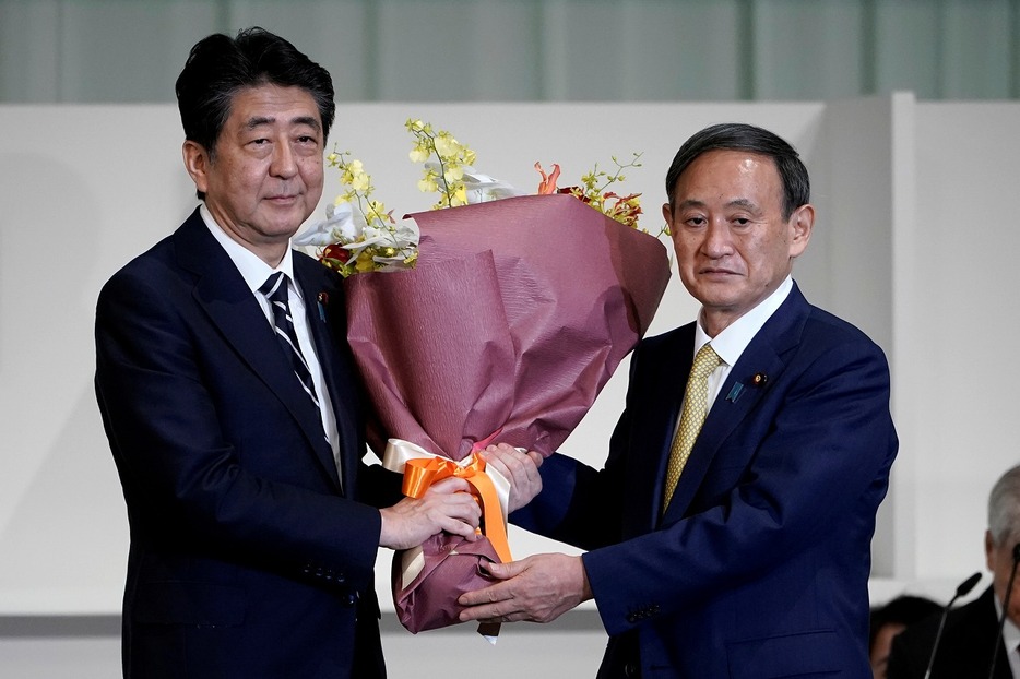 [写真]昨年9月の総裁選に勝利した菅義偉首相（写真：代表撮影／ロイター／アフロ）