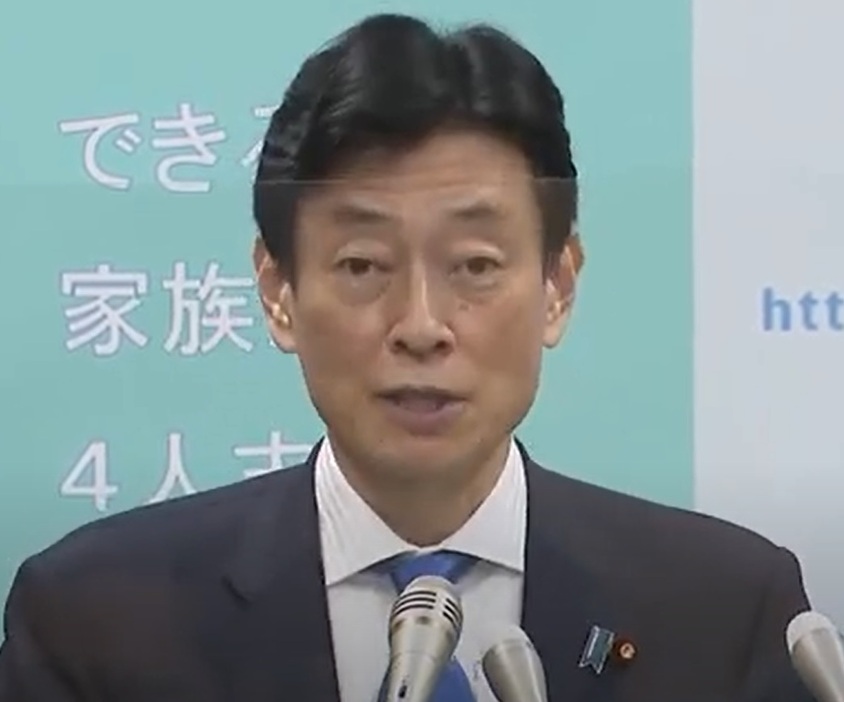 会見する西村担当相