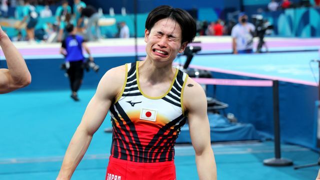 体操男子団体で金メダルを獲得した萱和磨選手(写真：西村尚己/アフロスポーツ)