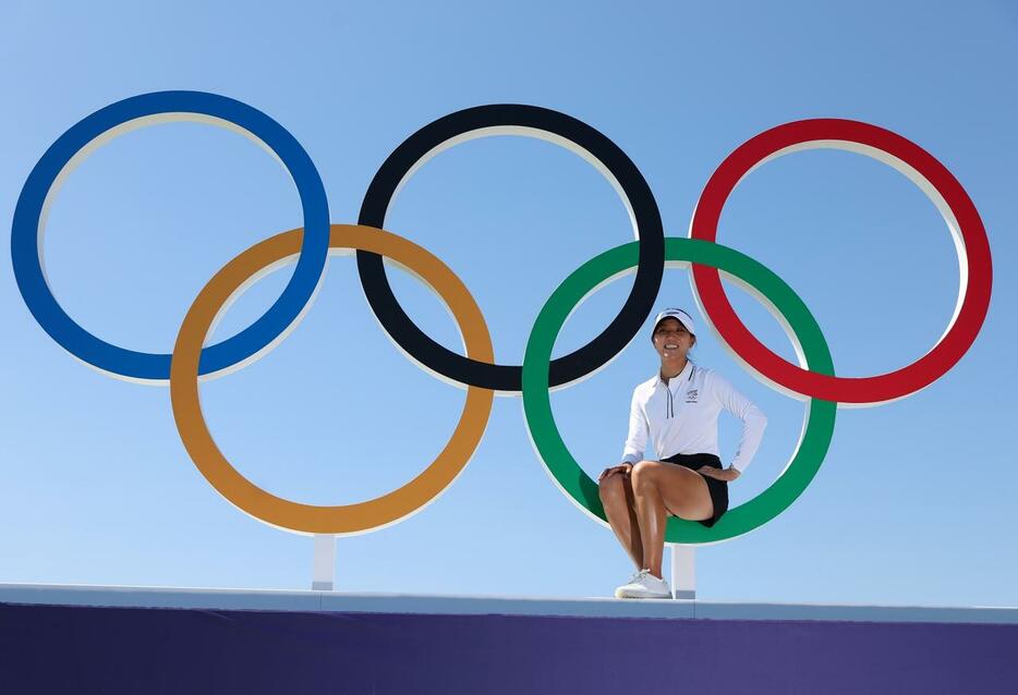 五輪マークの前で写真に納まるリディア・コー(PHOTO/Getty Images)