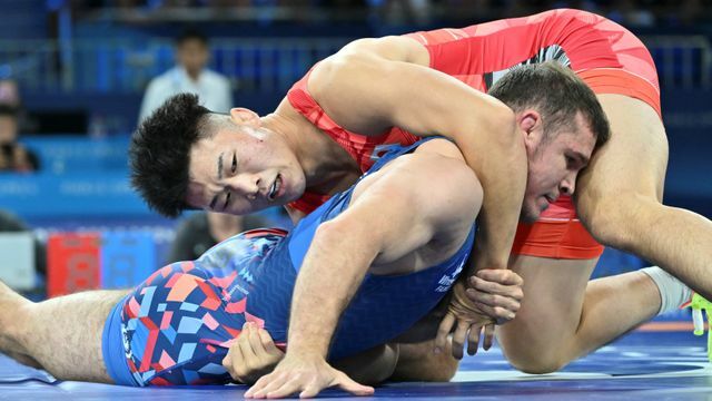 決勝進出を果たすレスリング日下尚選手(写真：エンリコ/アフロスポーツ)