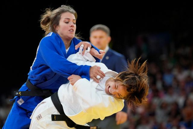 一本勝ちを収めた阿部詩選手（写真：AP/アフロ）