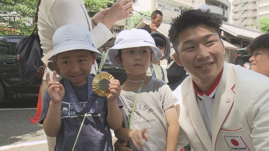 交流する日下選手