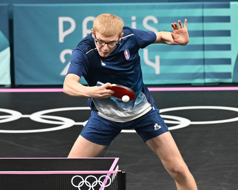 F.ルブランのライジングをとらえた裏面バックドライブ（Photo：ITTF/ONDA）