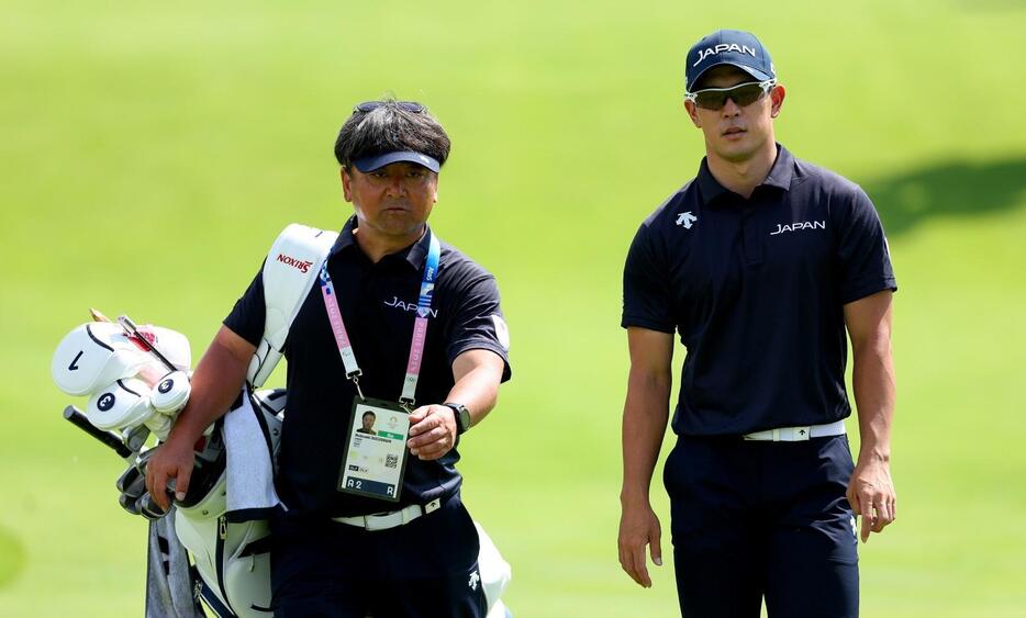 練習ラウンドをする中島啓太。杉澤伸章キャディと(PHOTO/Getty Images)