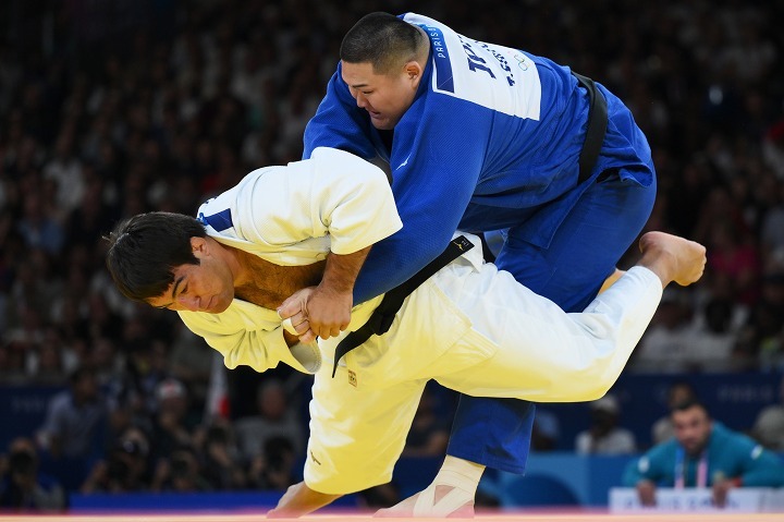 3位決定戦に敗れた斉藤（青）。(C)Getty Images