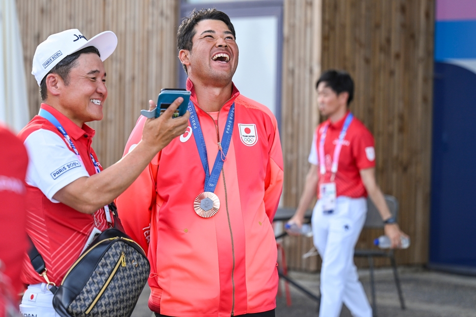 松山英樹のこの笑顔を引き出せるのも丸山茂樹の人柄だろう(PHOTO/Getty Images)