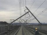 東日本大震災の被害が大きかった区間では電柱が軒並み倒れた＝宮城県の古川－くりこま高原間（JR東日本提供）