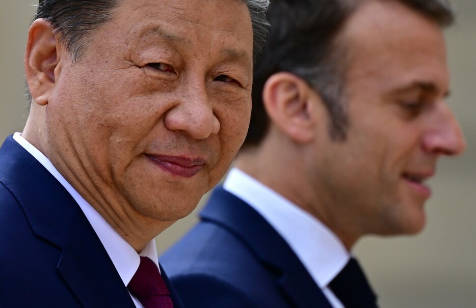 フランスを訪問し、マクロン大統領（右）と会談した中国の習近平国家主席。その内容には、互いの戦略が見え隠れした（Christian Liewig - Corbis / gettyimages）