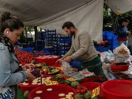 A vendor prepares artichokes for sale at the Friday Bazaar market in Istanbul in May. Photographer: Nicole Tung/Bloomberg