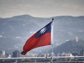 <p>A Taiwanese flag on a bridge in Taipei, Taiwan</p>
