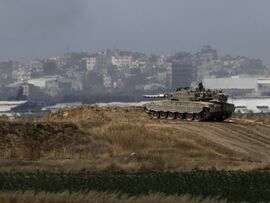 An Israeli tank near the border with Gaza in Southern Israel Photographer: Amir Levy/Getty Images