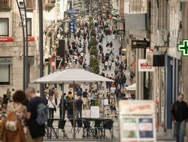 Shoppers on Rua do Principe in Vigo, Spain. Photographer: Brais Lorenzo Couto/Bloomberg