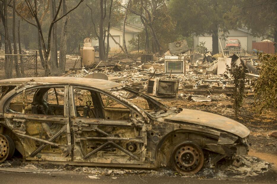 住宅など数百戸が焼失＝2015年9月13日（写真：ロイター/アフロ）