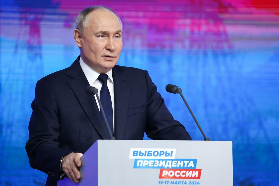 1月31日、ロシア大統領選の選挙運動員らとの会合で演説するプーチン大統領＝モスクワ（タス＝共同）
